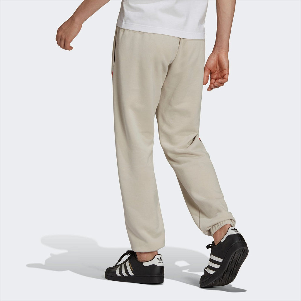 Beige adidas joggers on sale